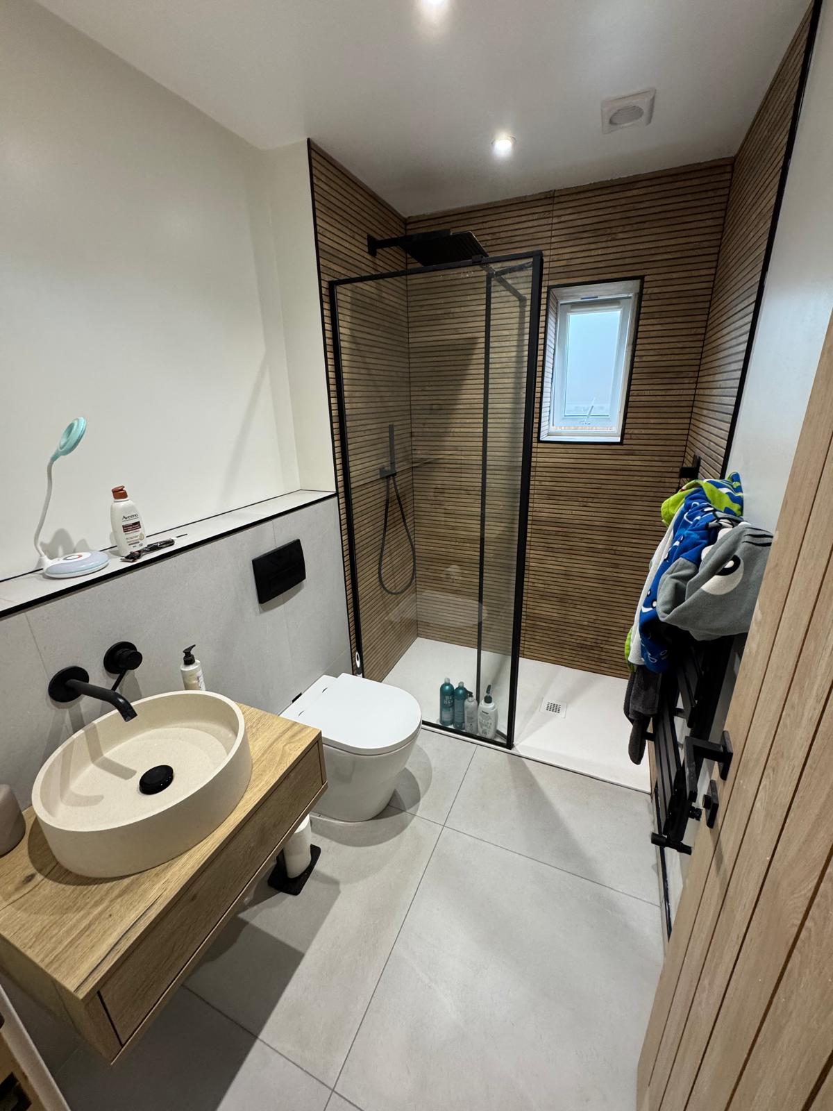 Contemporary Bathroom Renovation with Wood Slat Feature Wall