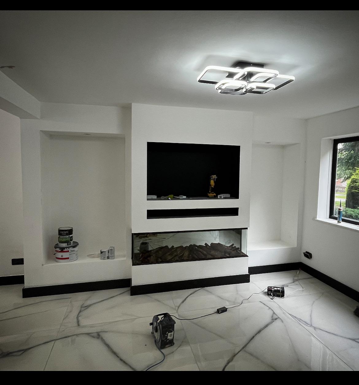 Bespoke Media Wall with Inset Fireplace & Marble Flooring