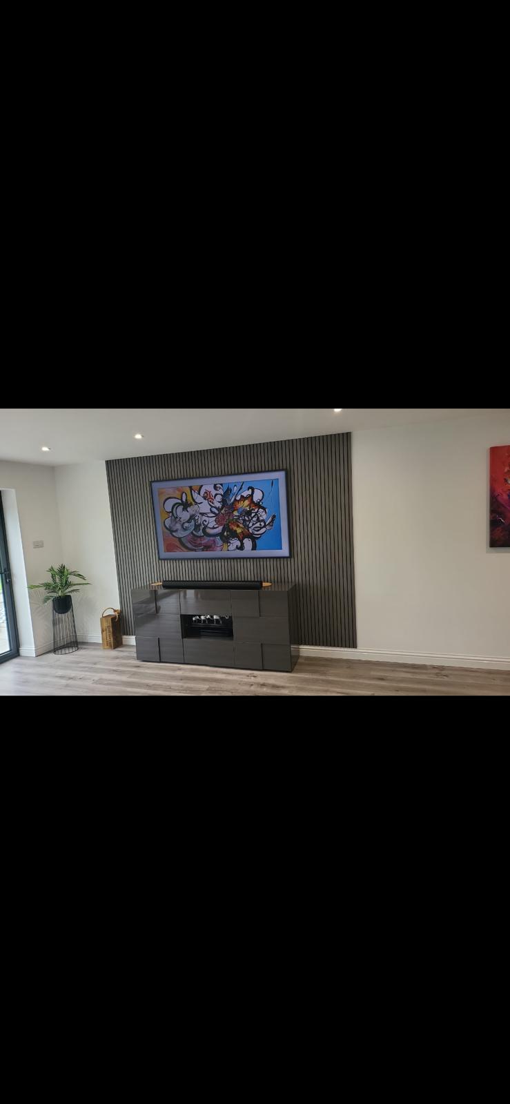 Bespoke Acoustic Slat Media Wall with Feature Fireplace