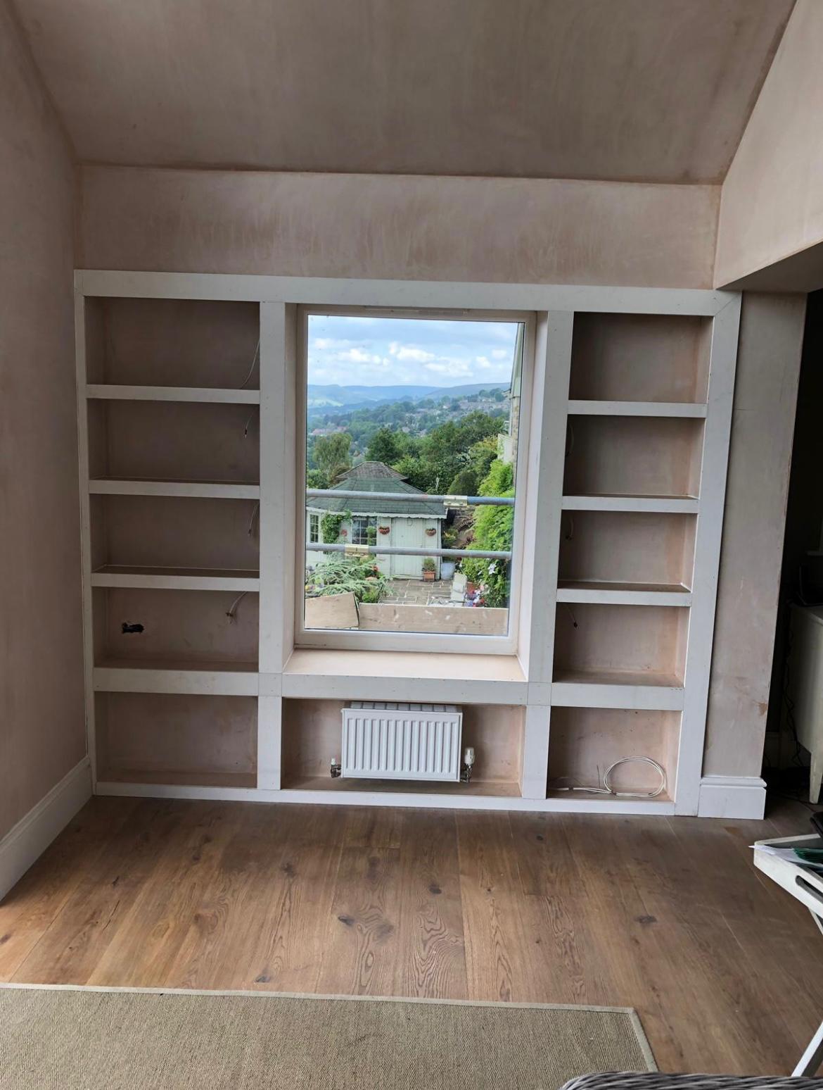 Bespoke Built-In Shelving Unit Around Window