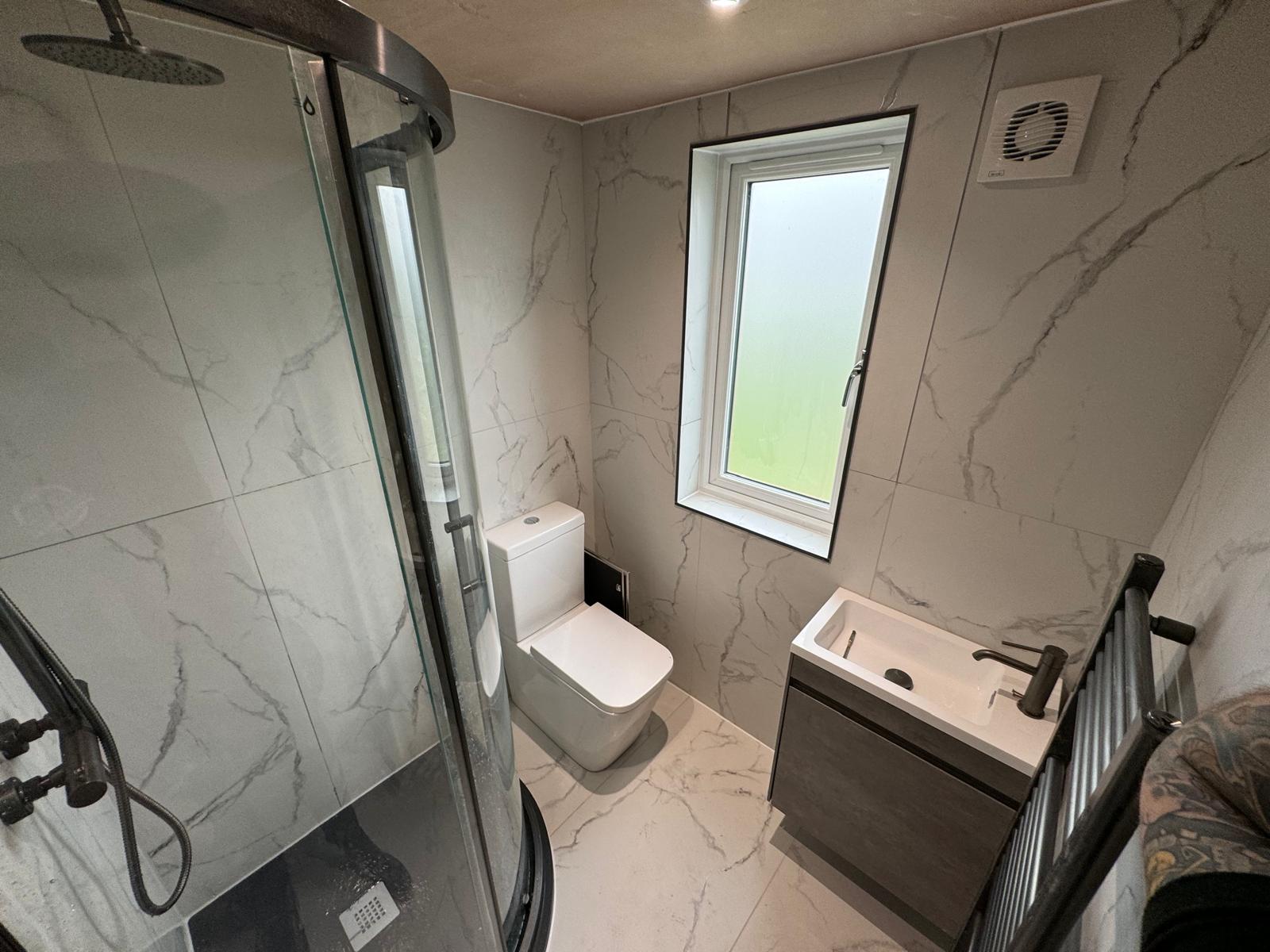 Compact Marble-Effect Shower Room with Quadrant Enclosure