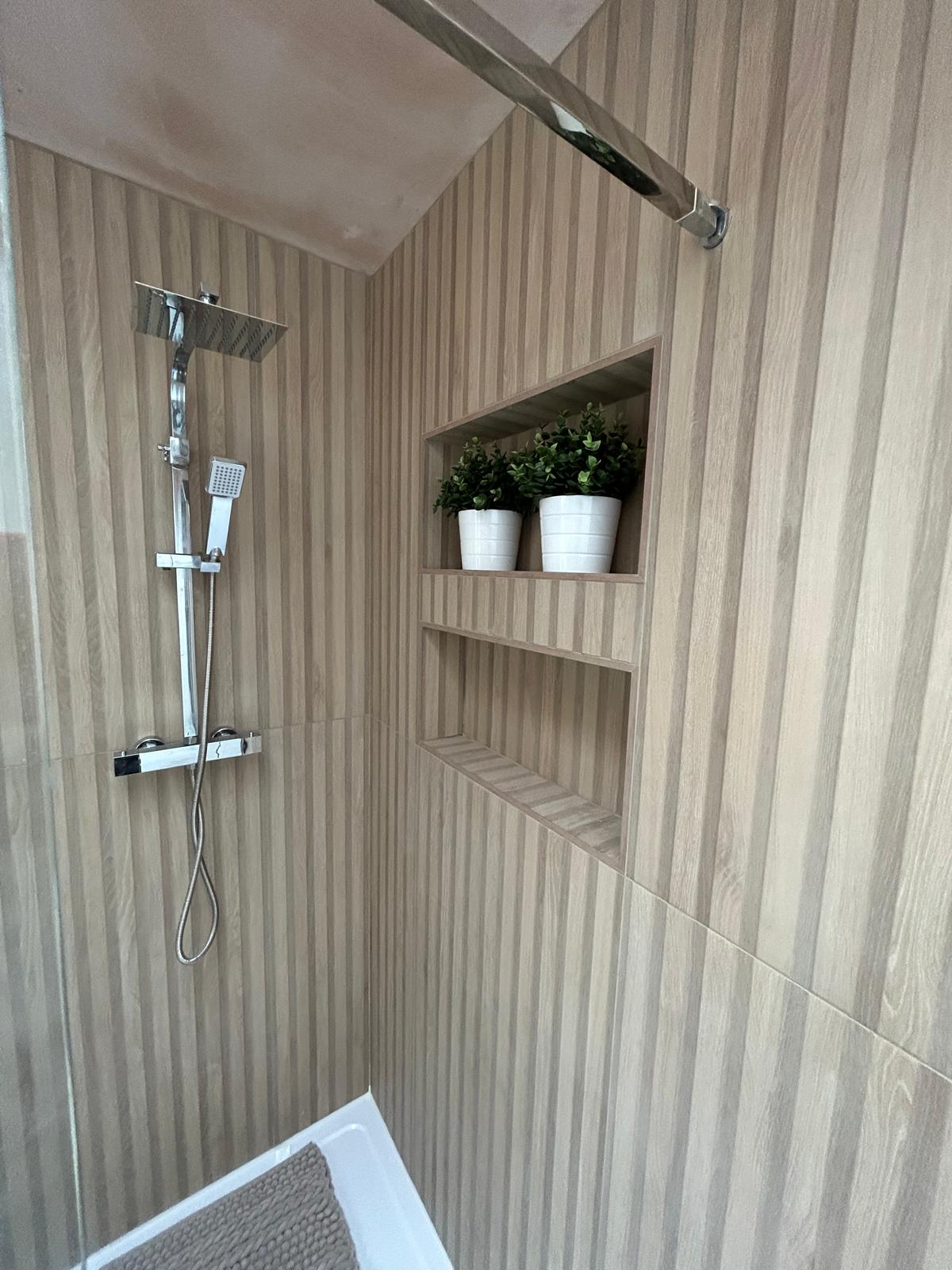Bespoke Tiled Shower Niche with Stepped Shelving Detail