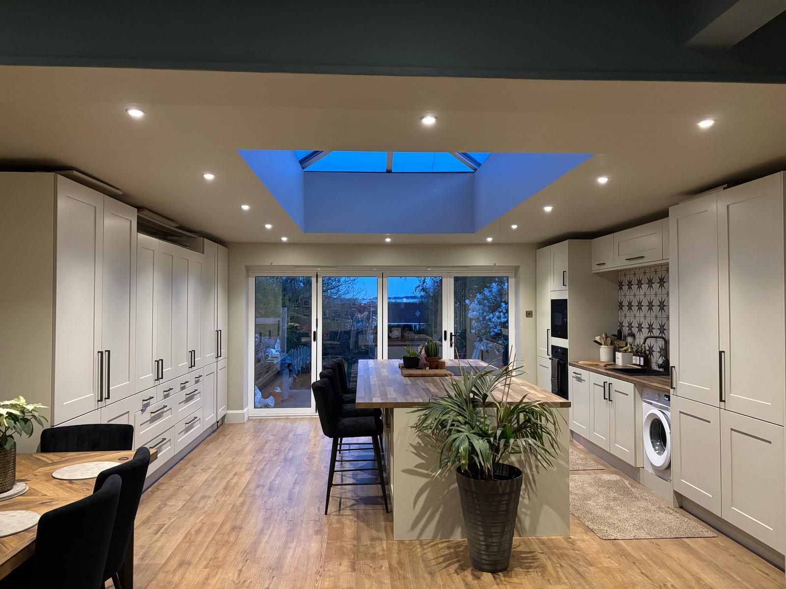 Warm White Shaker Kitchen & Utility — Evening View